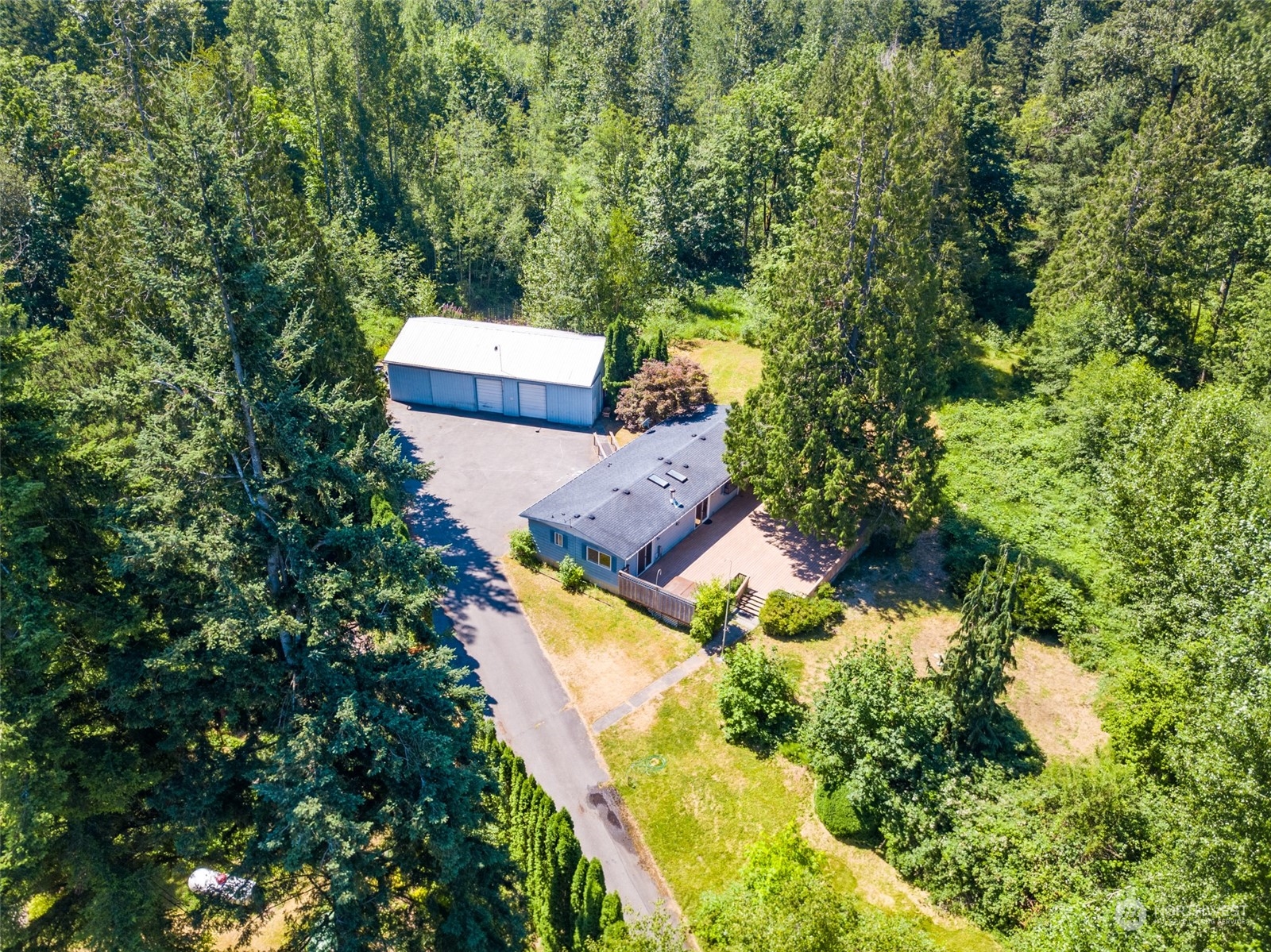 1069 East Axton Road Bellingham, WA 98226 - Photo 1 of 33 an aerial view of a house with a yard