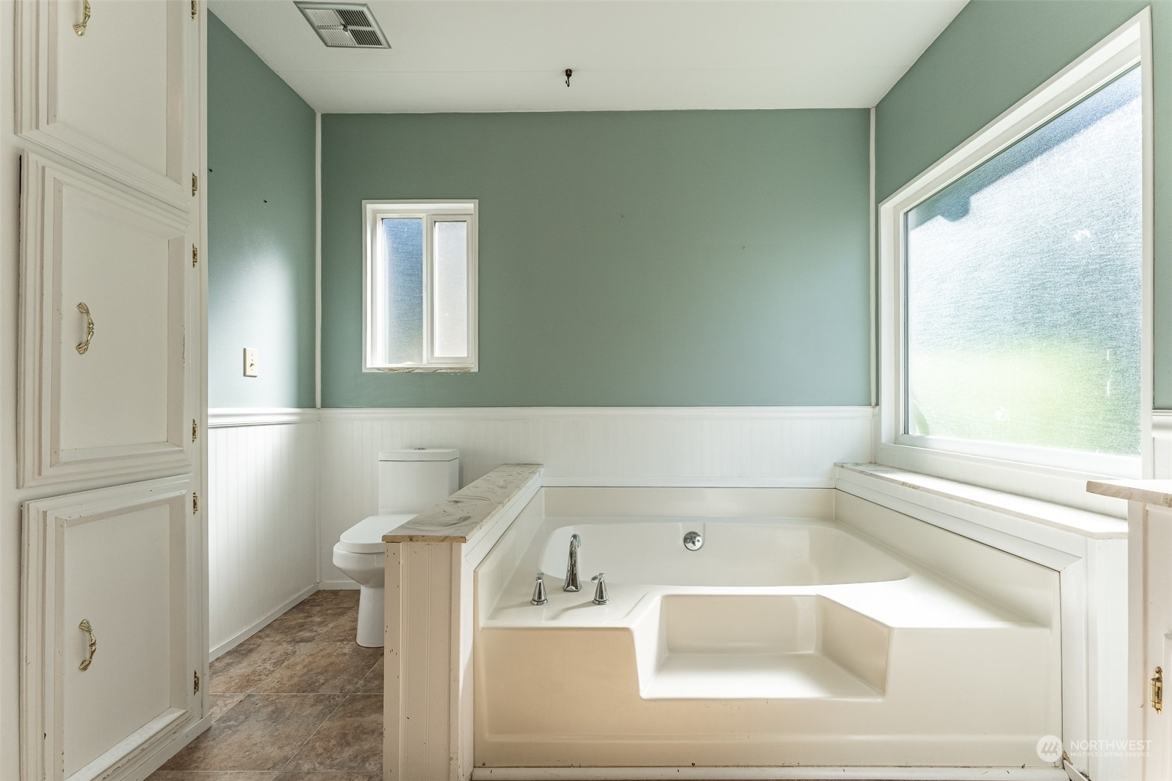 1069 East Axton Road Bellingham, WA 98226 - Photo 18 of 33 a bathroom with a bathtub and a sink