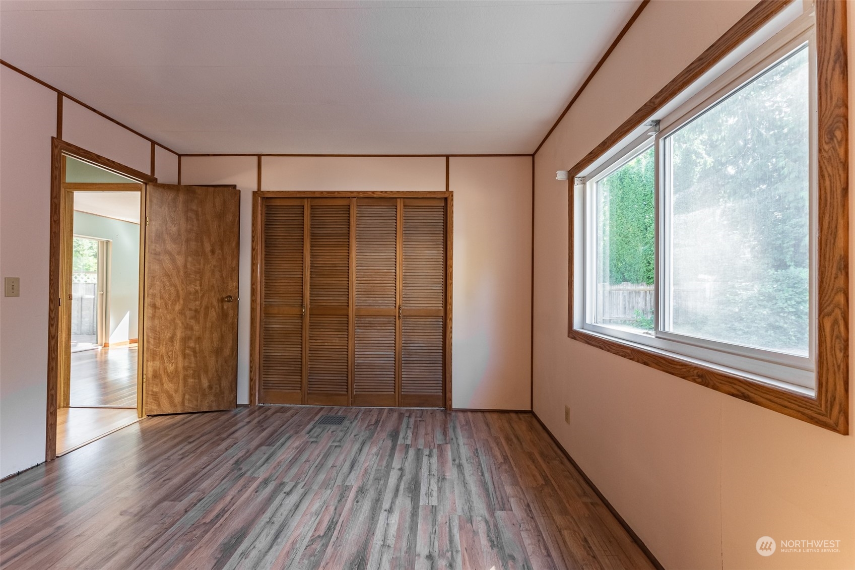 1069 East Axton Road Bellingham, WA 98226 - Photo 20 of 33 a view of an empty room with wooden floor and a window