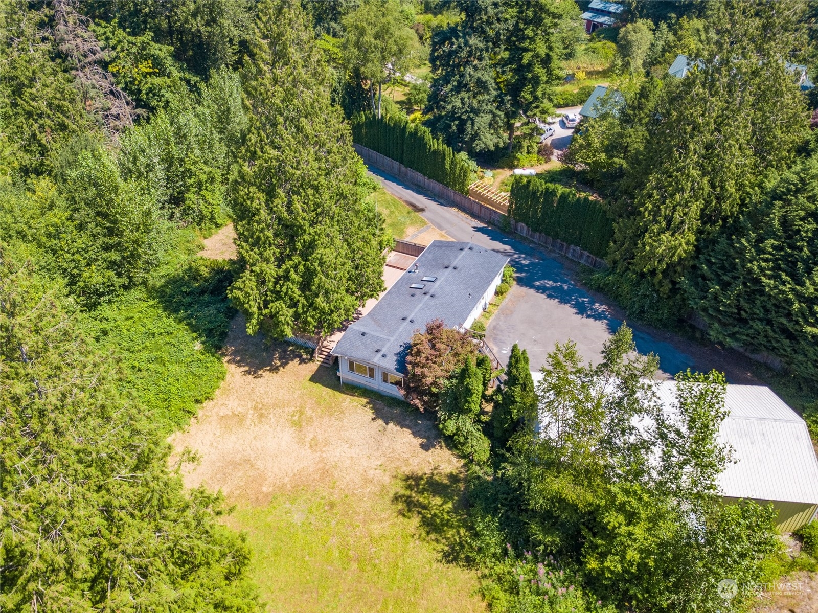 1069 East Axton Road Bellingham, WA 98226 - Photo 2 of 33 a view of a yard with plants
