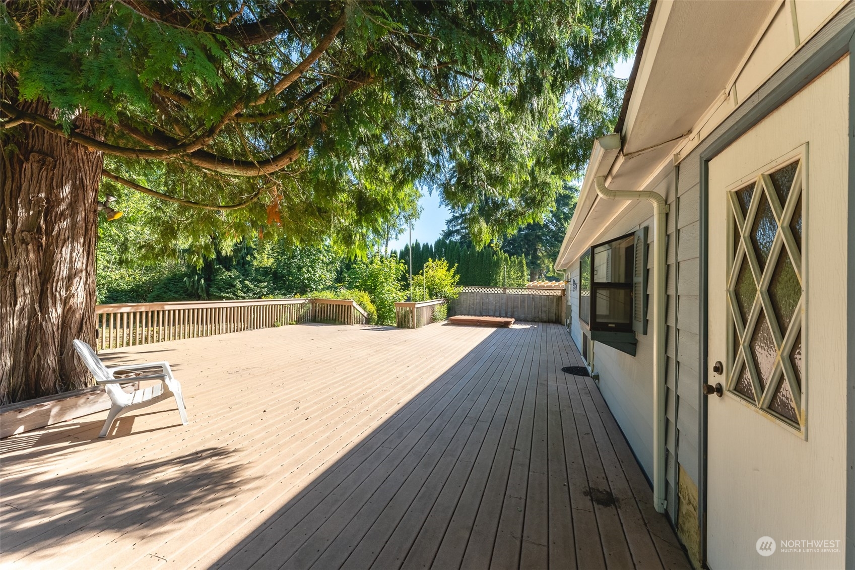 1069 East Axton Road Bellingham, WA 98226 - Photo 25 of 33 a view of a balcony with wooden floor and fence