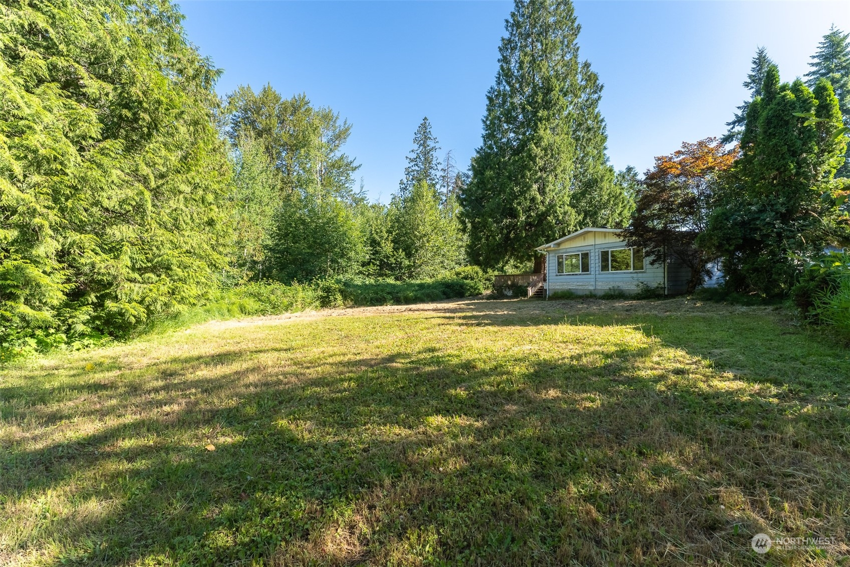 1069 East Axton Road Bellingham, WA 98226 - Photo 26 of 33 a view of yard with swimming pool and green space