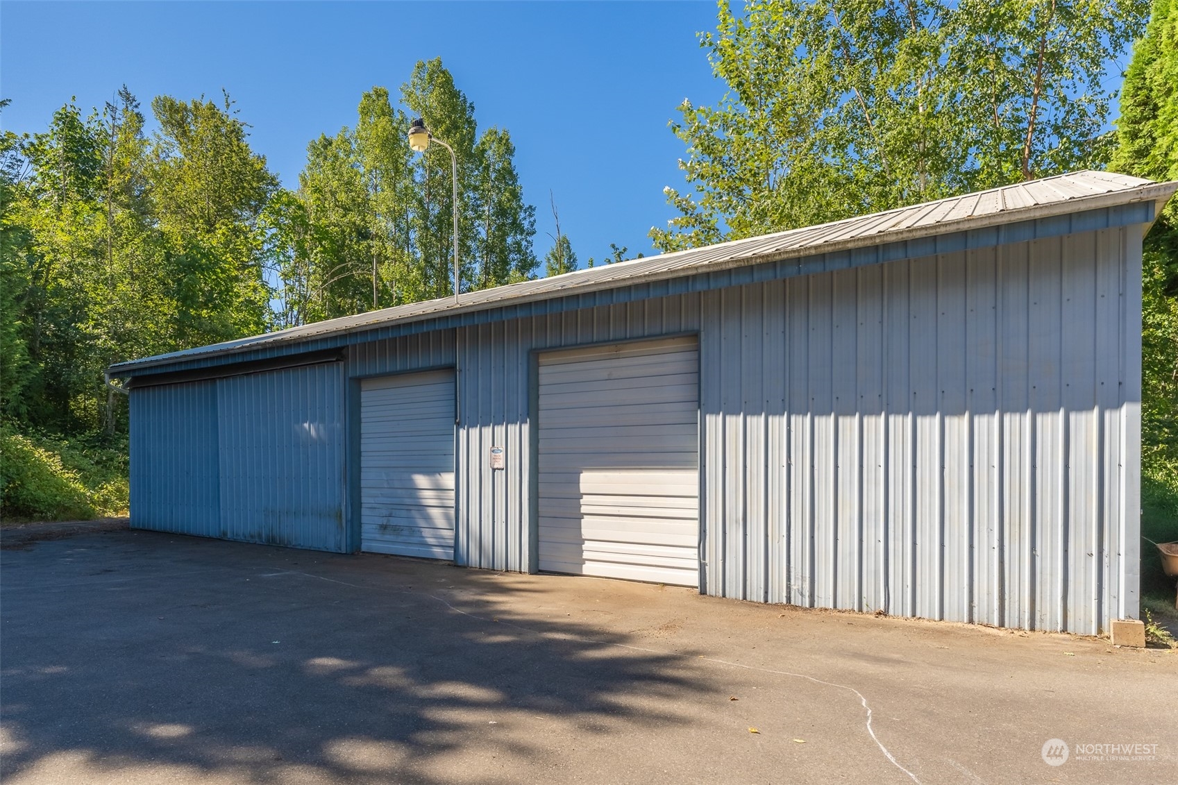 1069 East Axton Road Bellingham, WA 98226 - Photo 28 of 33 a view of a house with a backyard