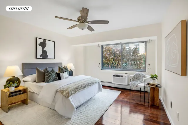 a bedroom with a large bed and a couch