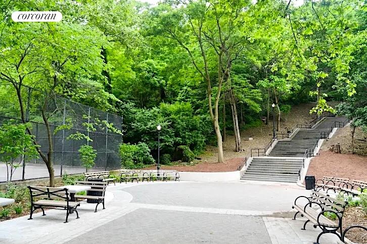 300 West 145th Street, Unit 1K Manhattan, NY 10039 - Photo 25 of 28 a view of backyard with a table and chairs and potted plants