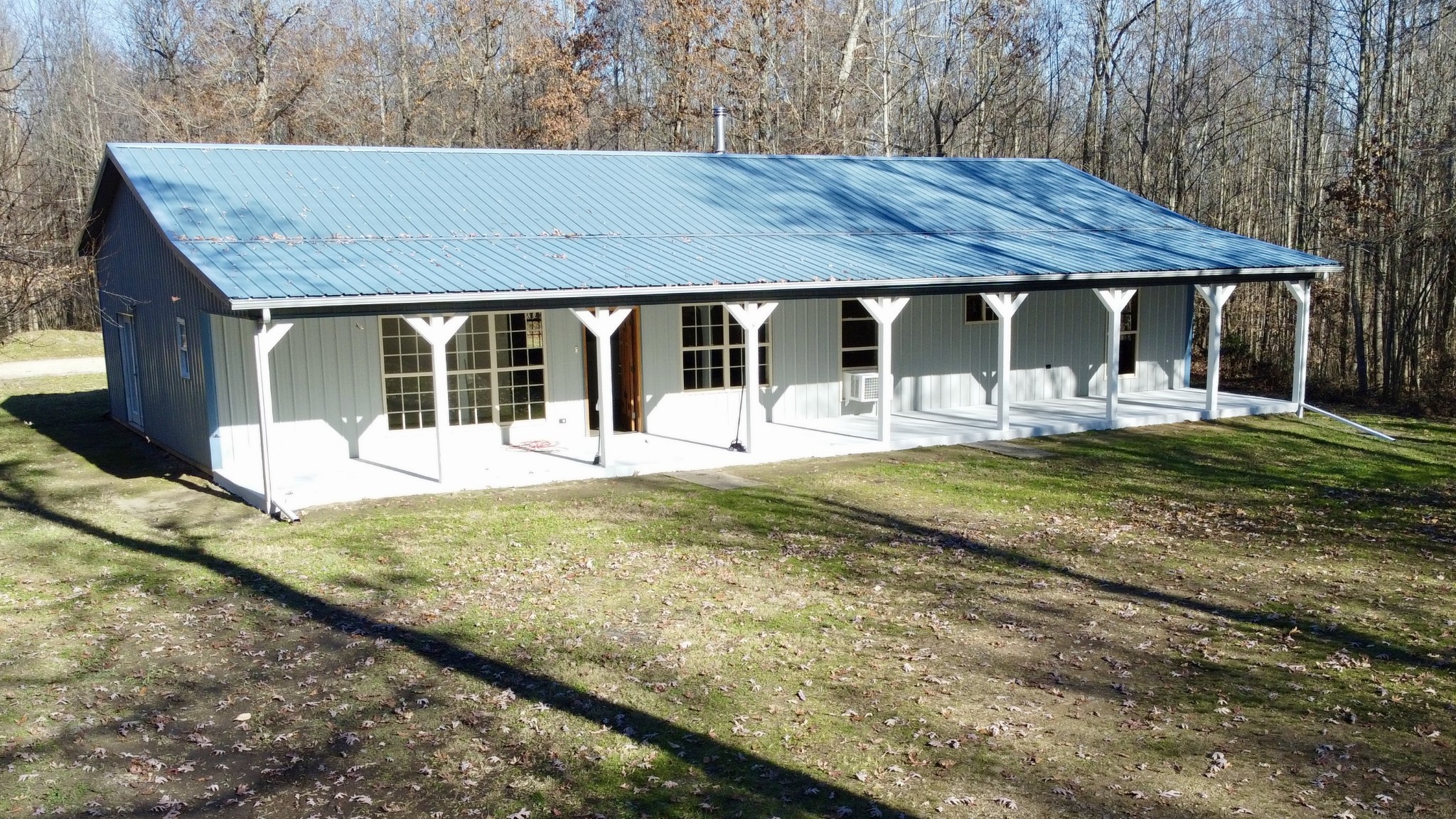 581 Nim Road Red Boiling Springs, TN 37150 - Photo 1 of 26 a view of a house with garden and sitting area