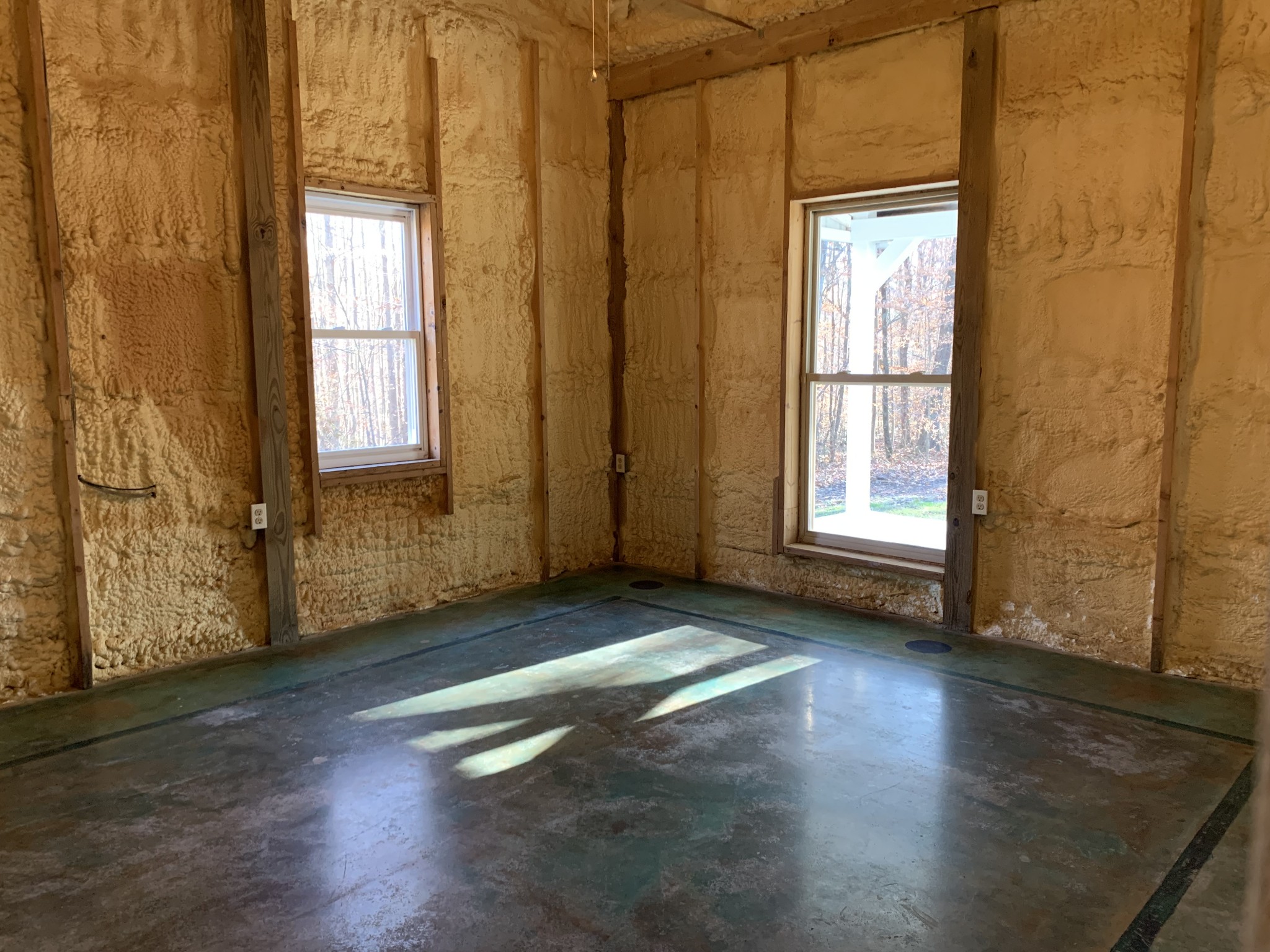 581 Nim Road Red Boiling Springs, TN 37150 - Photo 11 of 26 an empty room with wooden floor and windows