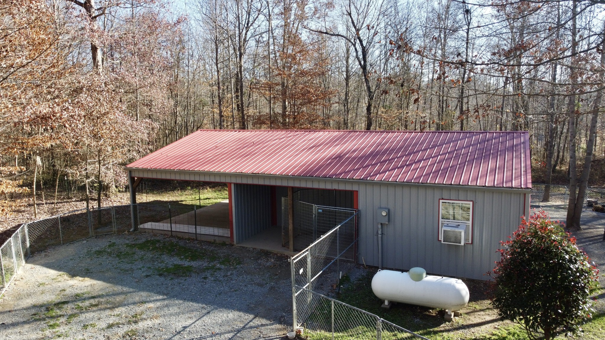 581 Nim Road Red Boiling Springs, TN 37150 - Photo 22 of 26 a backyard of a house with table and chairs