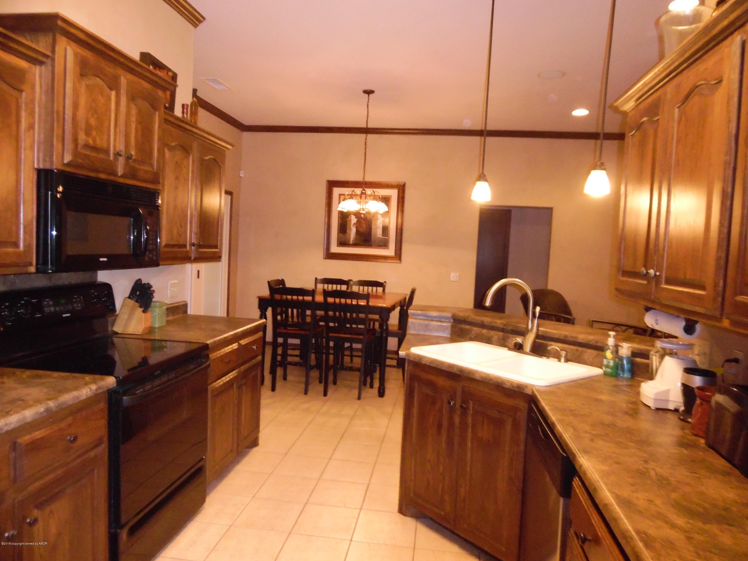 4207 Scotswood Drive Amarillo, TX 79110 - Photo 10 of 21 View to Dining Room