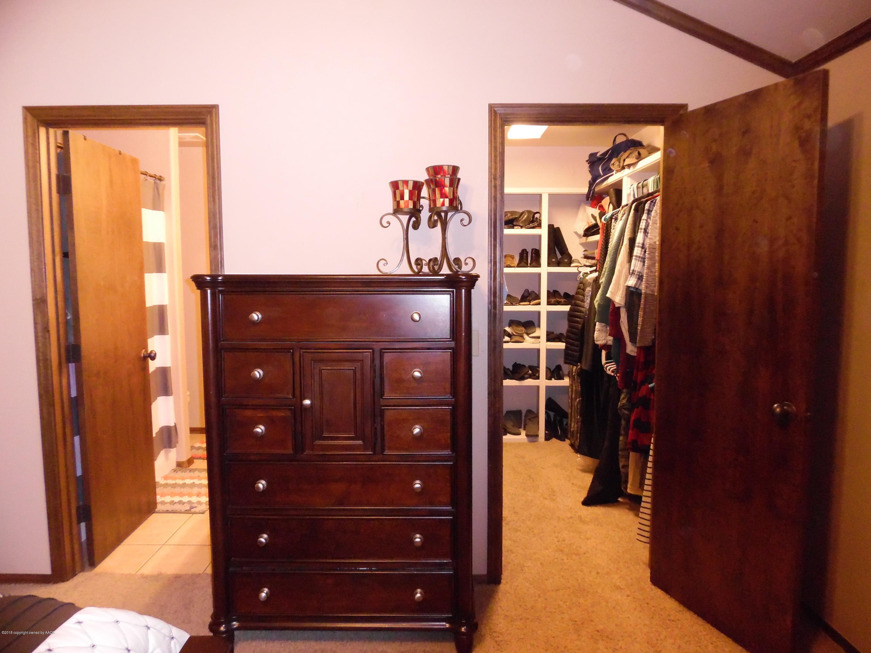 4207 Scotswood Drive Amarillo, TX 79110 - Photo 12 of 21 Walk-in Master Closet & Master Bath