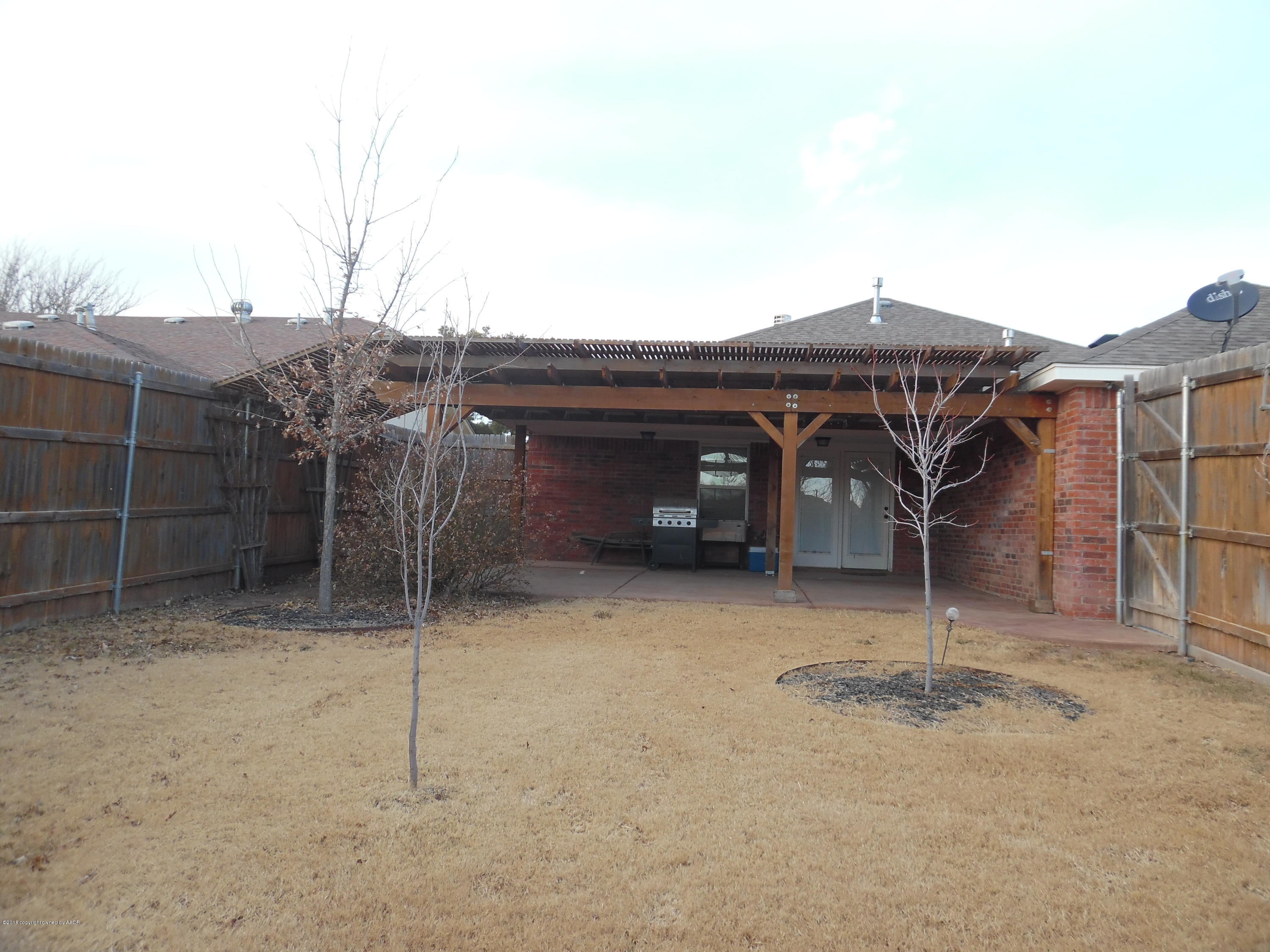 4207 Scotswood Drive Amarillo, TX 79110 - Photo 18 of 21 Backyard with 8 foot privacy fence!