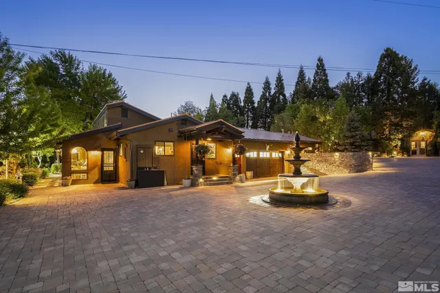 a swimming pool with outdoor seating and yard