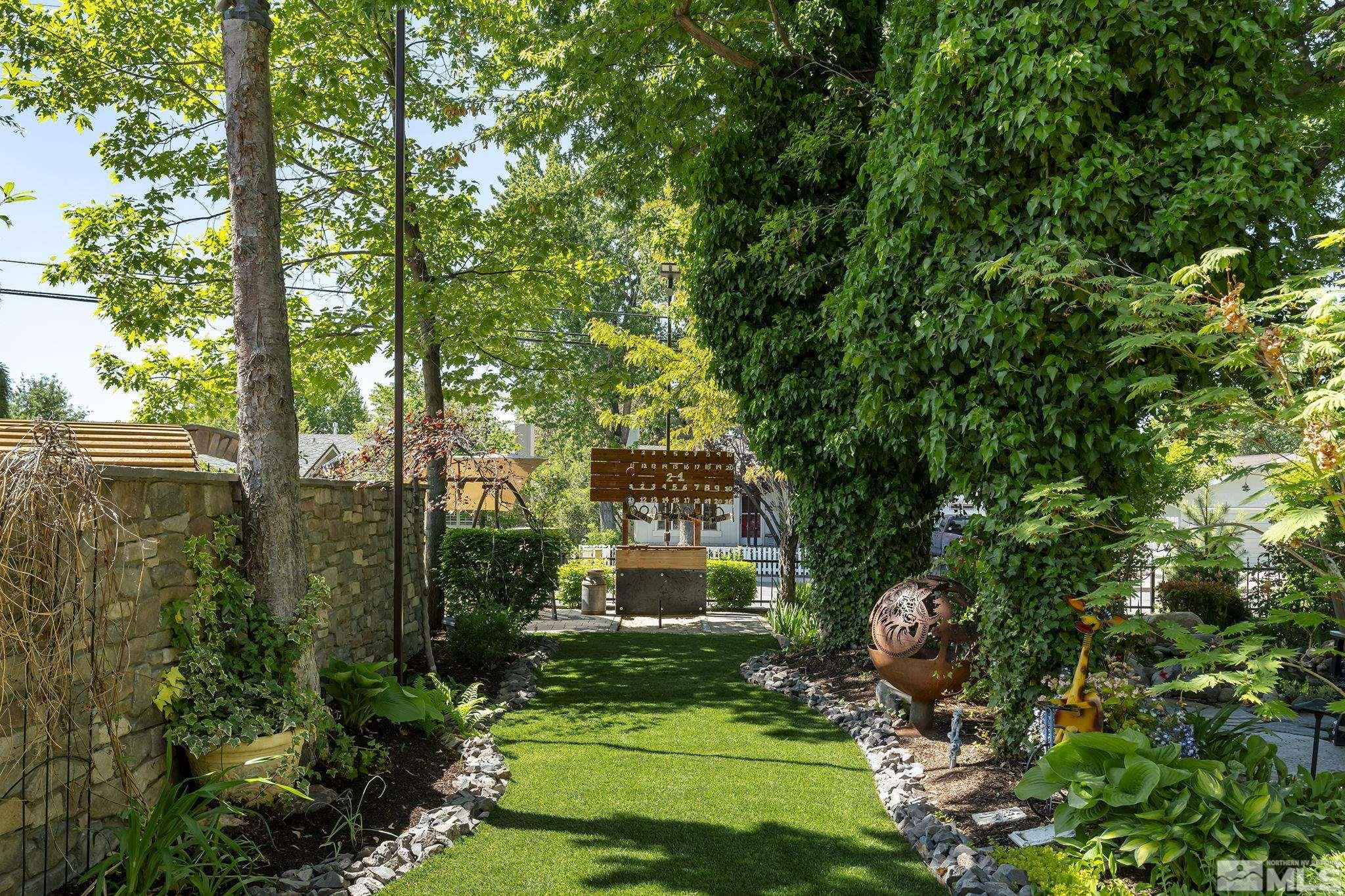 930 Spanish Springs Road Sparks, NV 89434 - Photo 12 of 40 a front view of a house with a yard