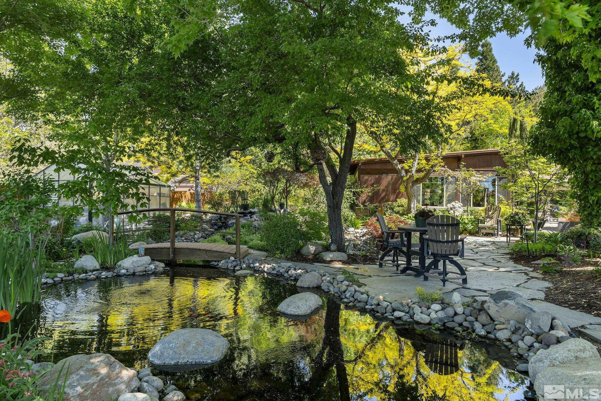 930 Spanish Springs Road Sparks, NV 89434 - Photo 15 of 40 a view of swimming pool with lawn chairs and plants