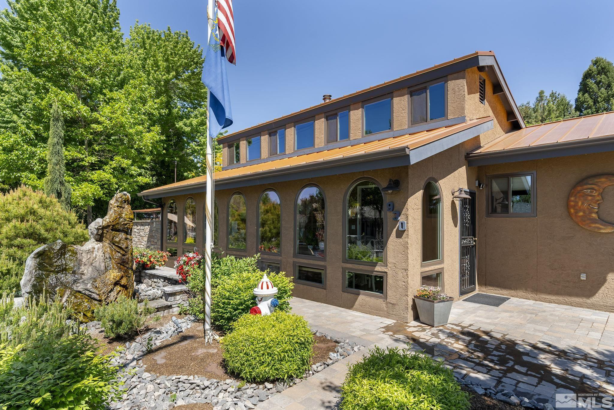 930 Spanish Springs Road Sparks, NV 89434 - Photo 19 of 40 a front view of a house with a yard