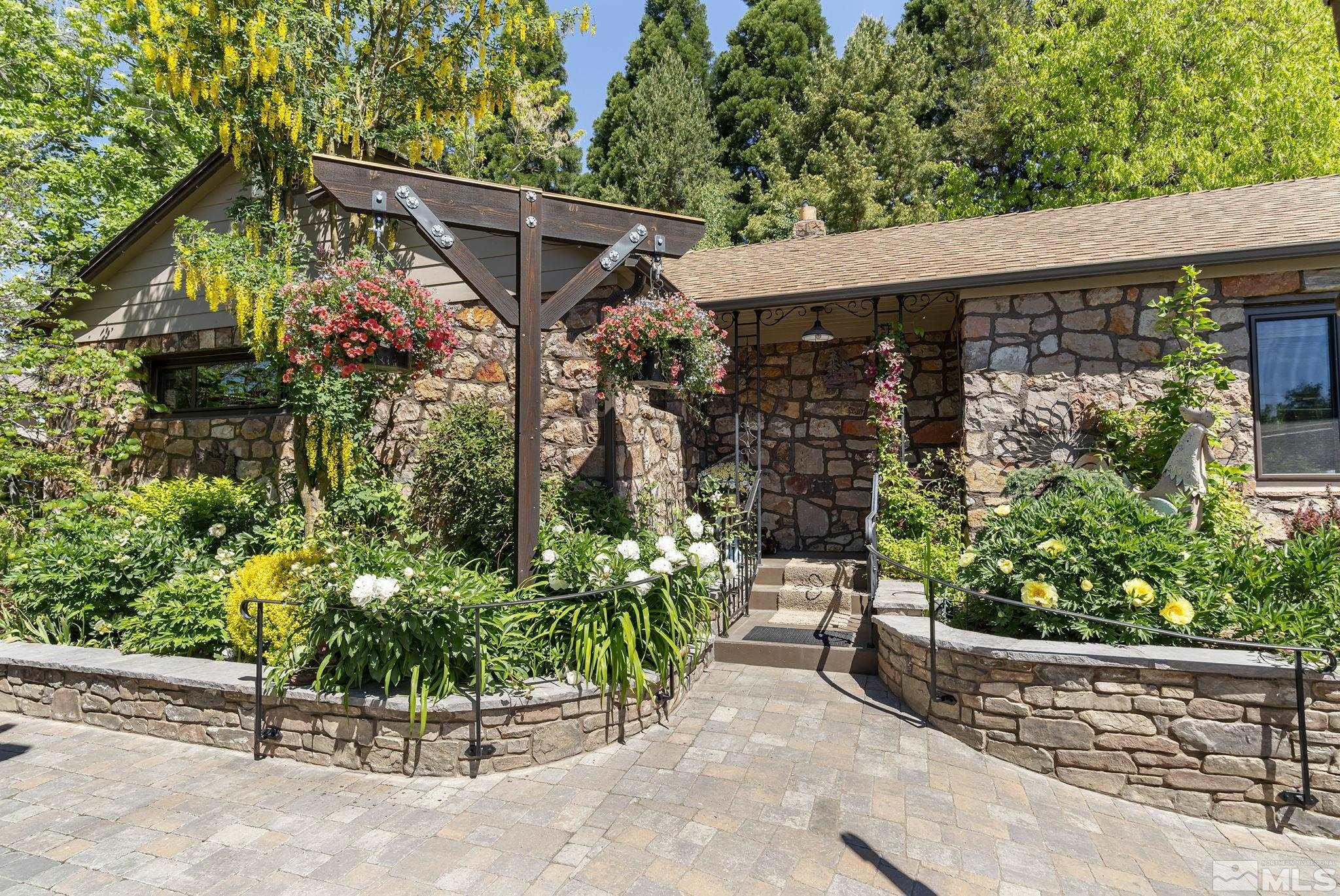 930 Spanish Springs Road Sparks, NV 89434 - Photo 26 of 40 a view of a chair and table in the patio