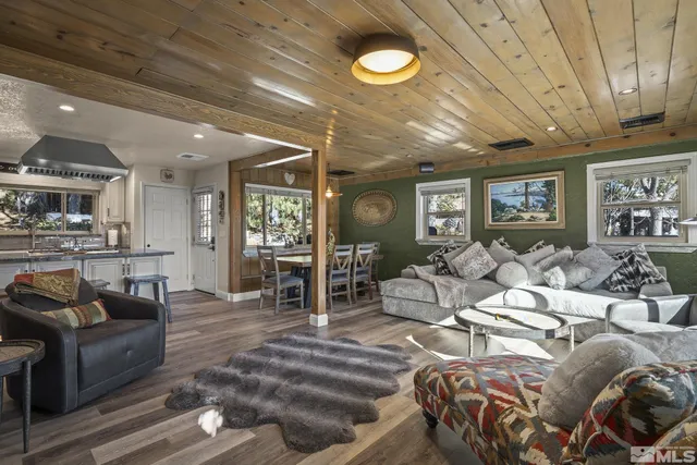 a kitchen with stainless steel appliances granite countertop a stove a sink and a cabinets