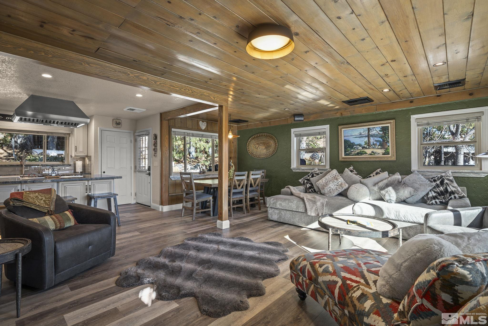 930 Spanish Springs Road Sparks, NV 89434 - Photo 27 of 40 a living room with furniture and wooden floor