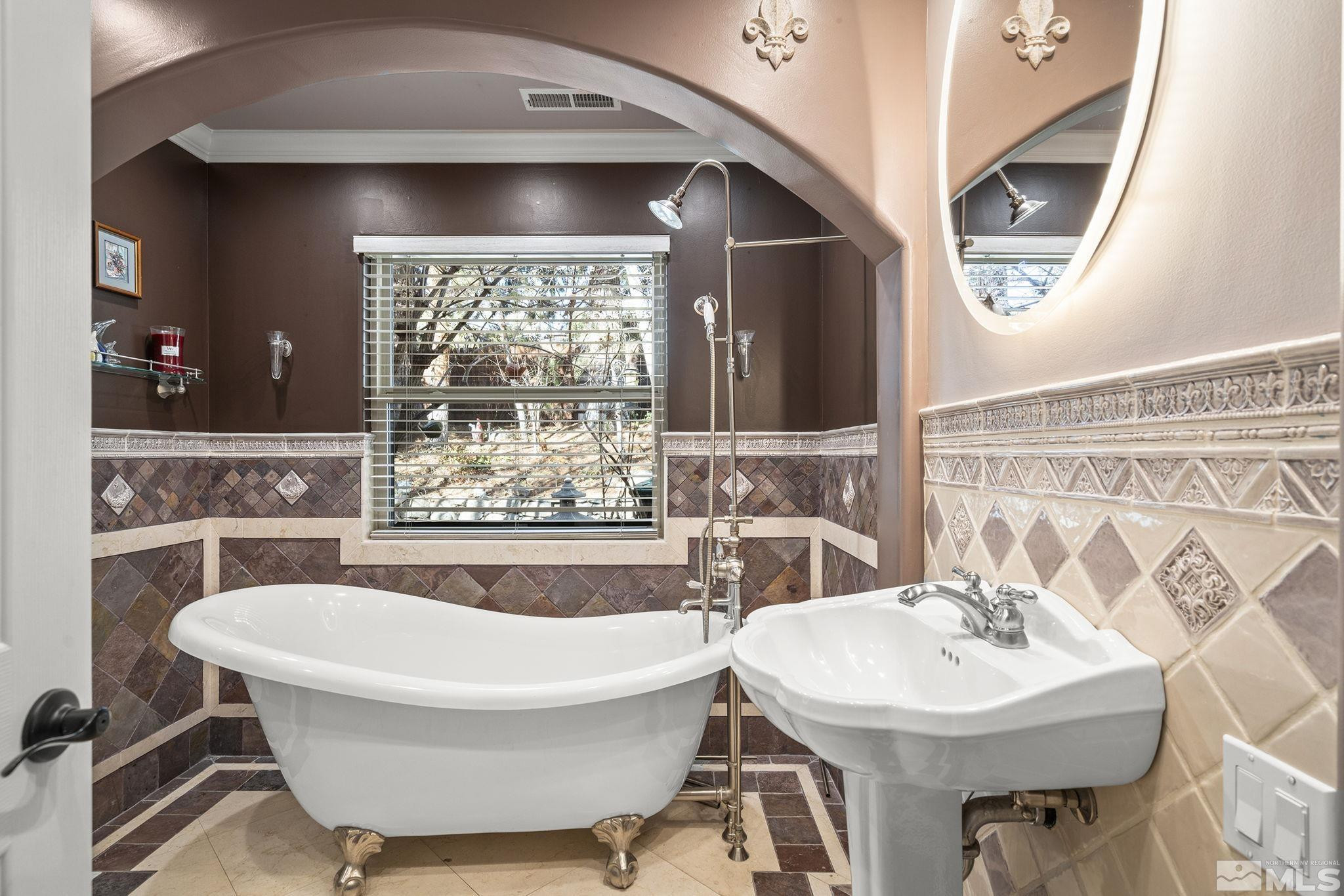 930 Spanish Springs Road Sparks, NV 89434 - Photo 31 of 40 a bathroom with a sink and a mirror