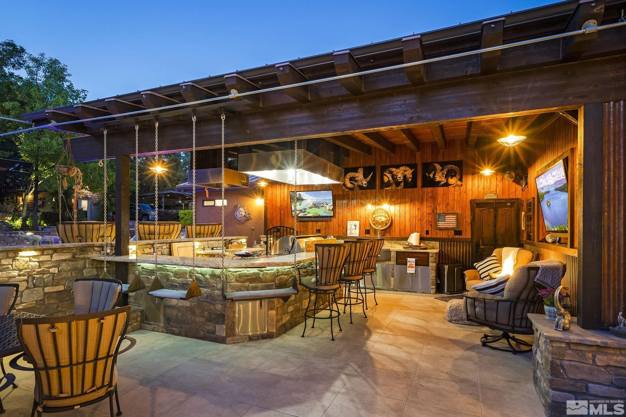 930 Spanish Springs Road Sparks, NV 89434 - Photo 5 of 40 a view of a chairs and tables in the patio