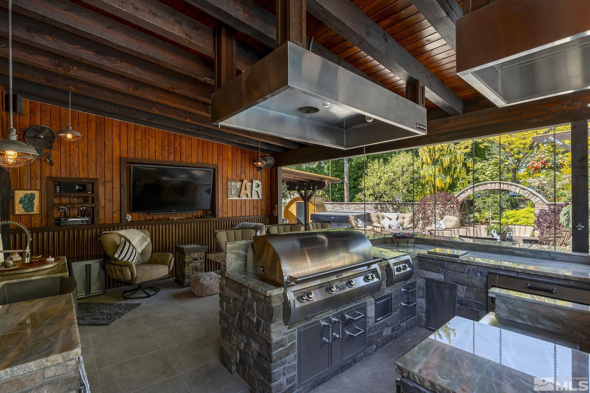 930 Spanish Springs Road Sparks, NV 89434 - Photo 9 of 40 a kitchen with stove and cabinets