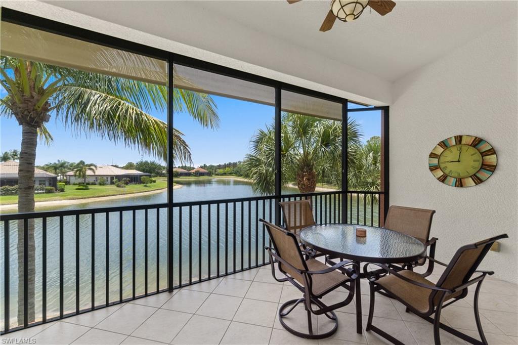 6414 Legacy Circle, Unit 903 Naples, FL 34113 - Photo 2 of 50 a view of a chairs and table in patio