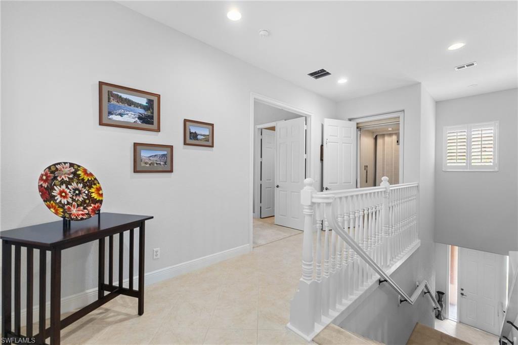 6414 Legacy Circle, Unit 903 Naples, FL 34113 - Photo 8 of 50 a view of entryway with stairs