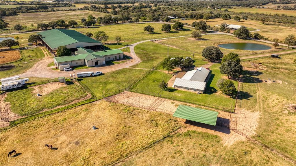 1003 Lamkin Road Mineral Wells, TX 76067 - Photo 27 of 40 Overview of rural landscape with a nearby body of water