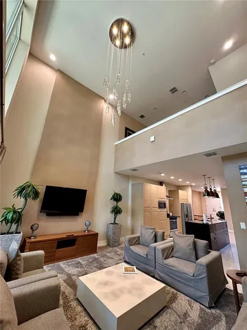 a view of a terrace with furniture and wooden floor