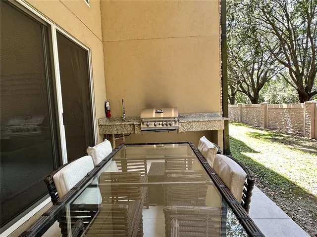 a bedroom with a bed and a large mirror