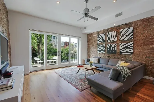 a kitchen with stainless steel appliances granite countertop a stove a sink and a granite counter tops