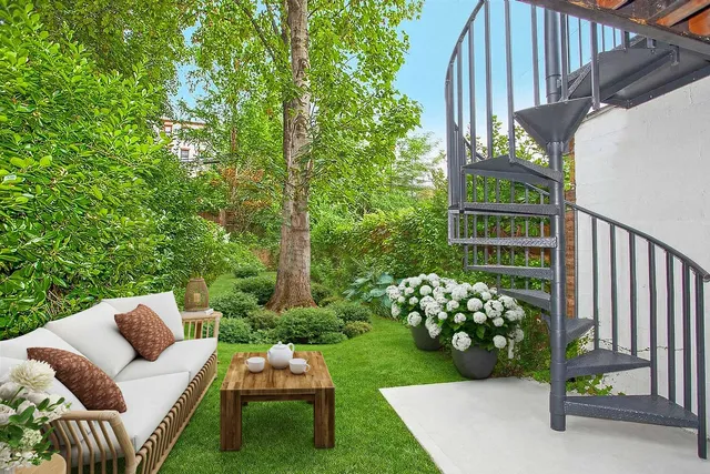 a view of a deck with furniture