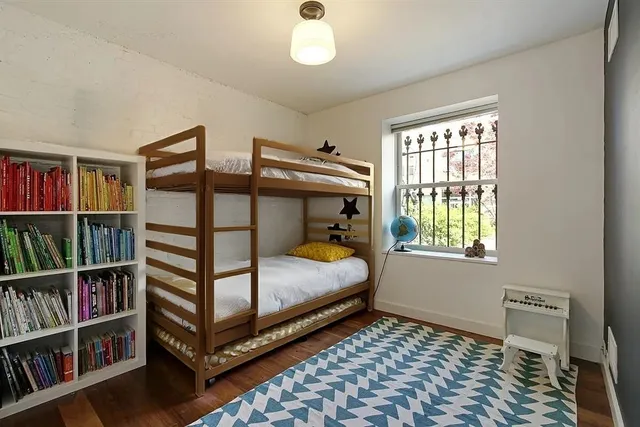 a bathroom with a sink vanity and a mirror