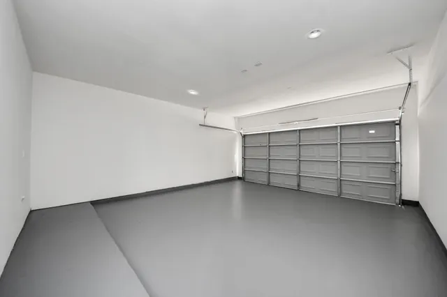 a view of a house with backyard and garden