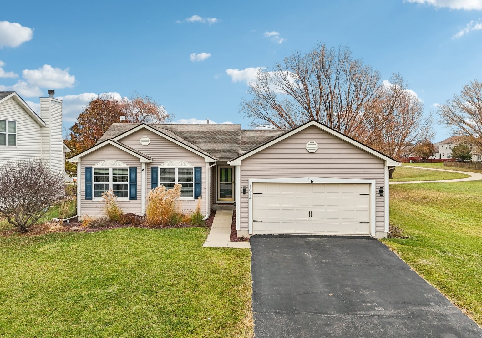 1024 Misty Landing Court Malta, IL 60150 - Photo 1 of 28 a view of a house with a yard and fence