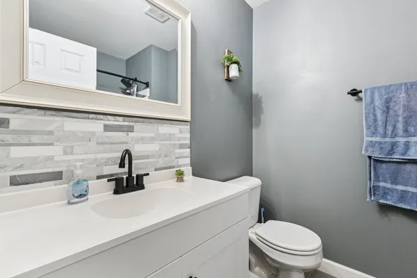 a bathroom with a sink and a toilet
