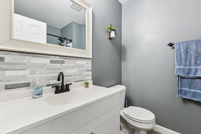 a bathroom with a sink and a toilet