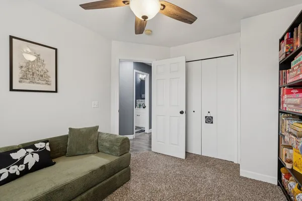 a living room with furniture and a window