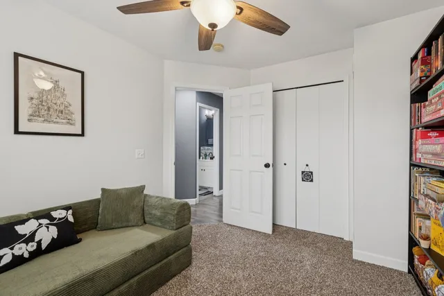 a living room with furniture and a window