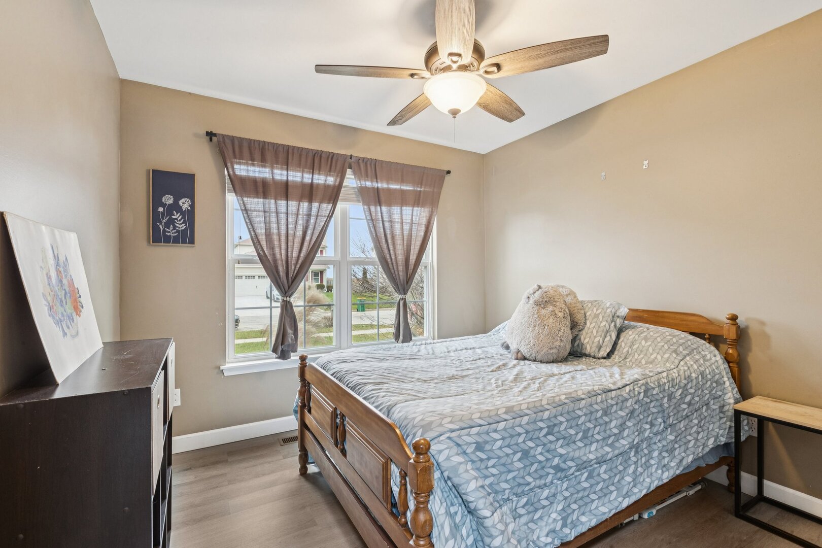 1024 Misty Landing Court Malta, IL 60150 - Photo 15 of 28 a bedroom with a bed and window