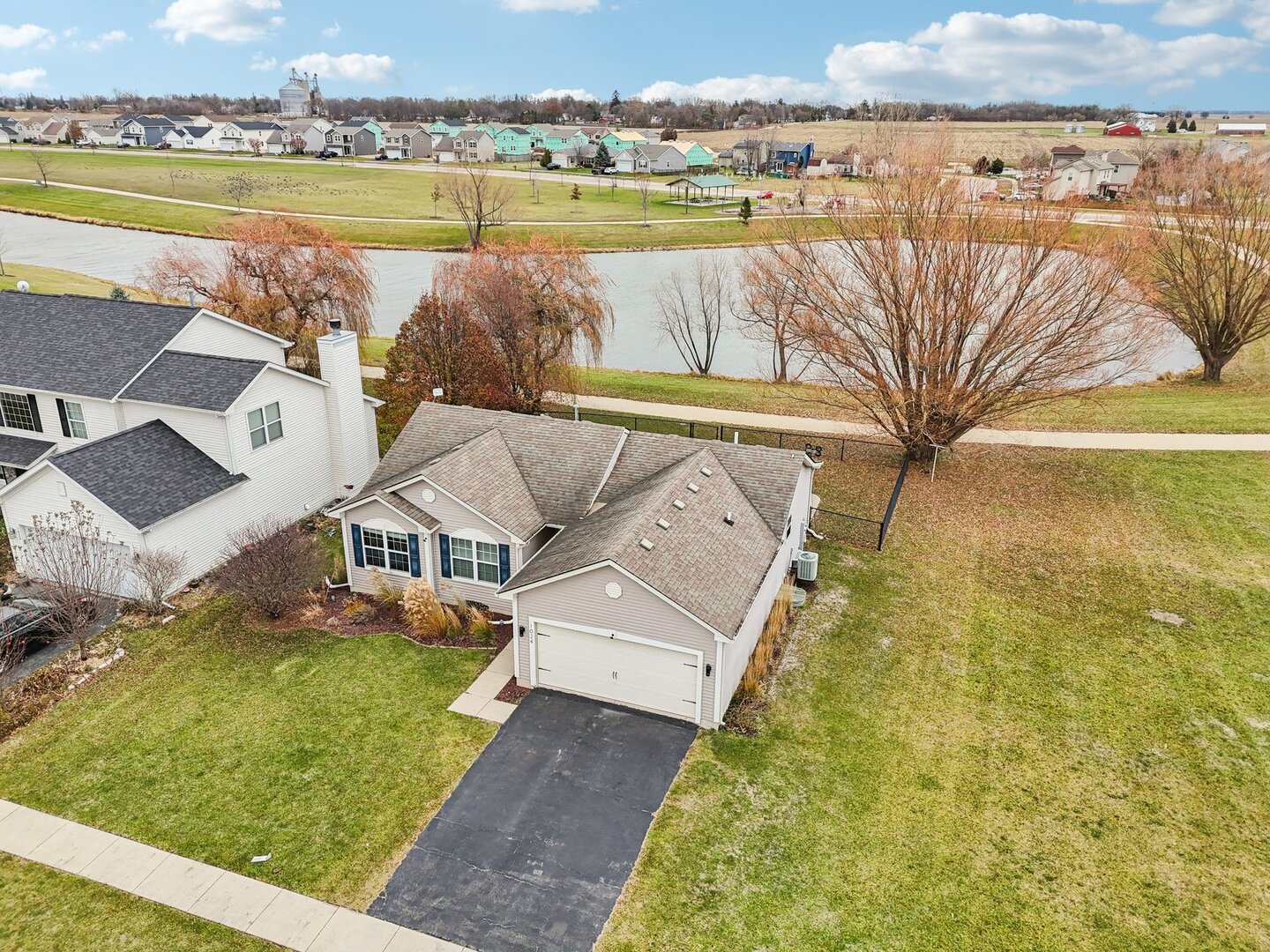 1024 Misty Landing Court Malta, IL 60150 - Photo 2 of 28 a view of a swimming pool with a lake view