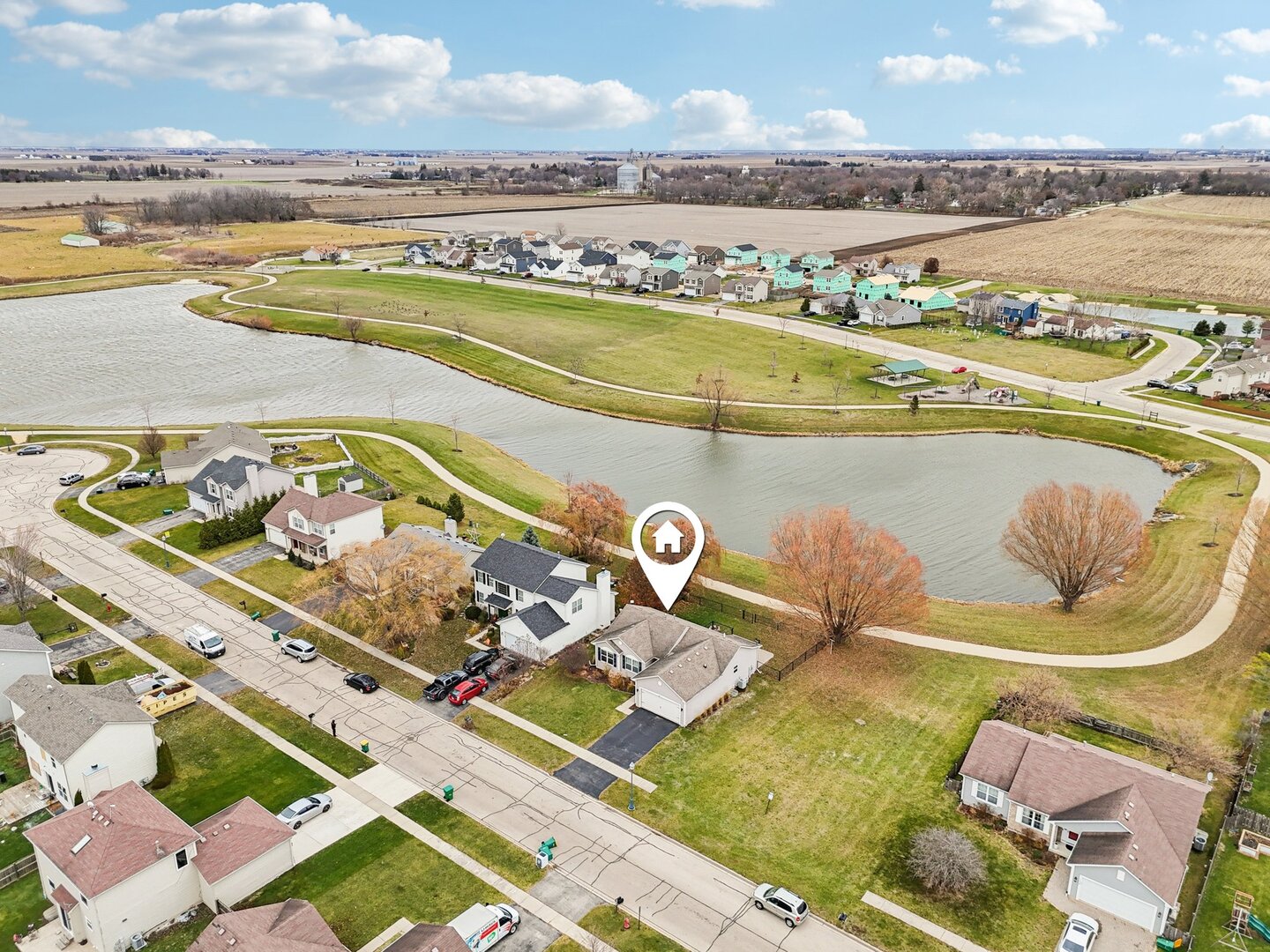 1024 Misty Landing Court Malta, IL 60150 - Photo 28 of 28 a view of a swimming pool with an ocean view