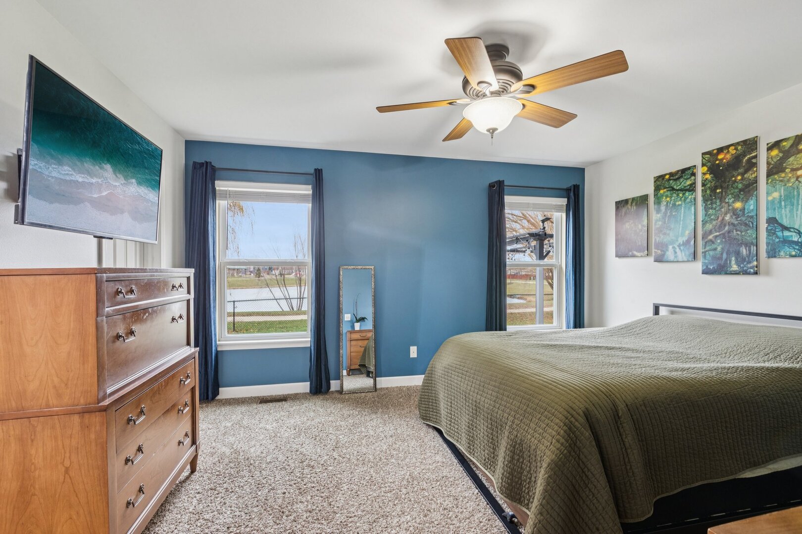1024 Misty Landing Court Malta, IL 60150 - Photo 10 of 28 a bedroom with a bed and a large window