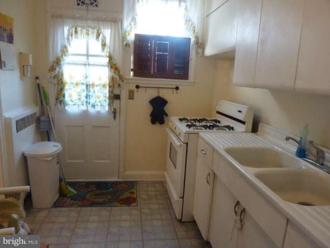 619 Stamford Road Baltimore, MD 21229 - Photo 6 of 17 a bathroom with a sink and a toilet