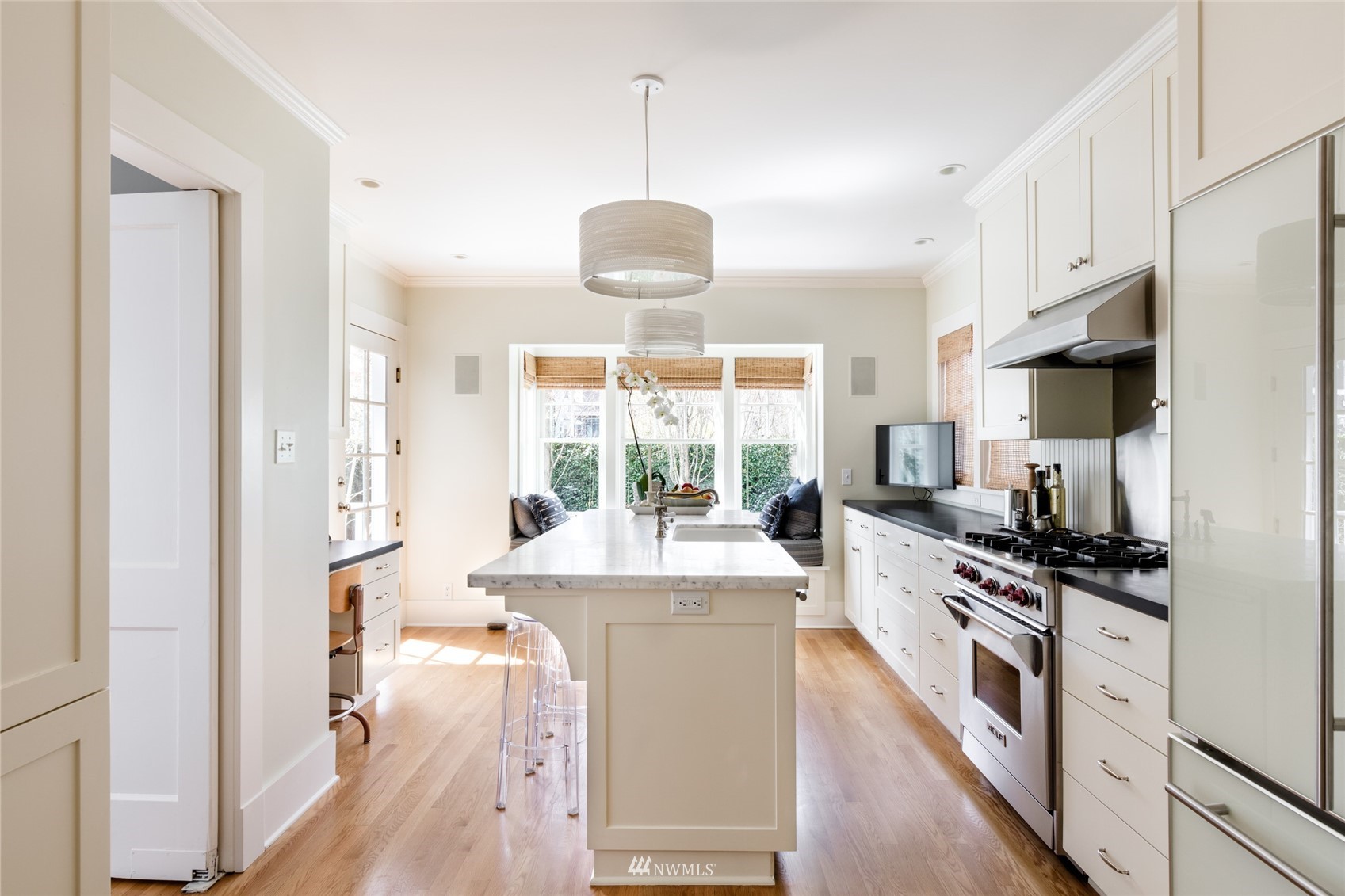 617 35th Avenue Seattle, WA 98122 - Photo 11 of 40 a kitchen with a sink stove and refrigerator
