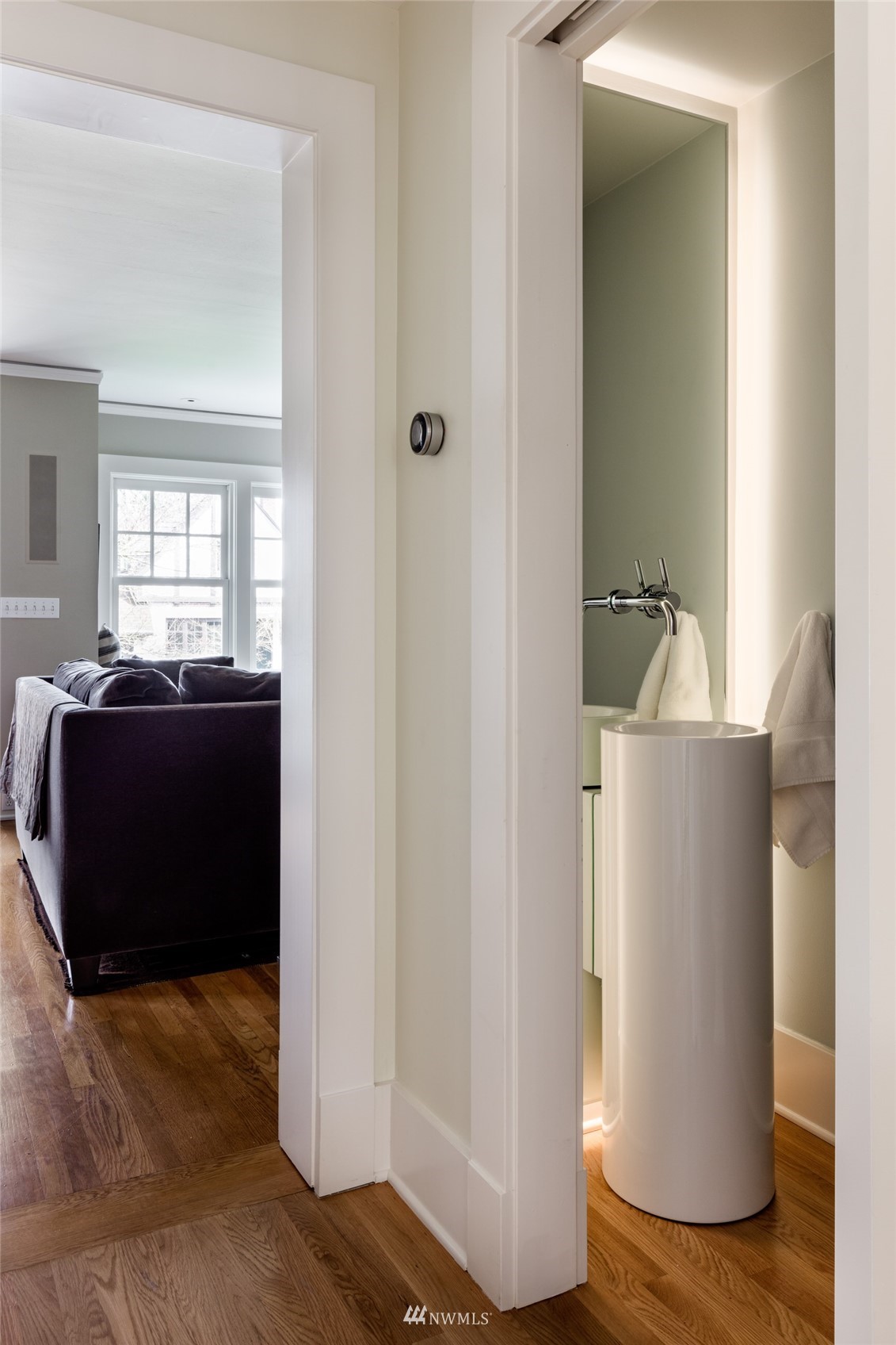 617 35th Avenue Seattle, WA 98122 - Photo 16 of 40 a view of a living room with furniture and a window