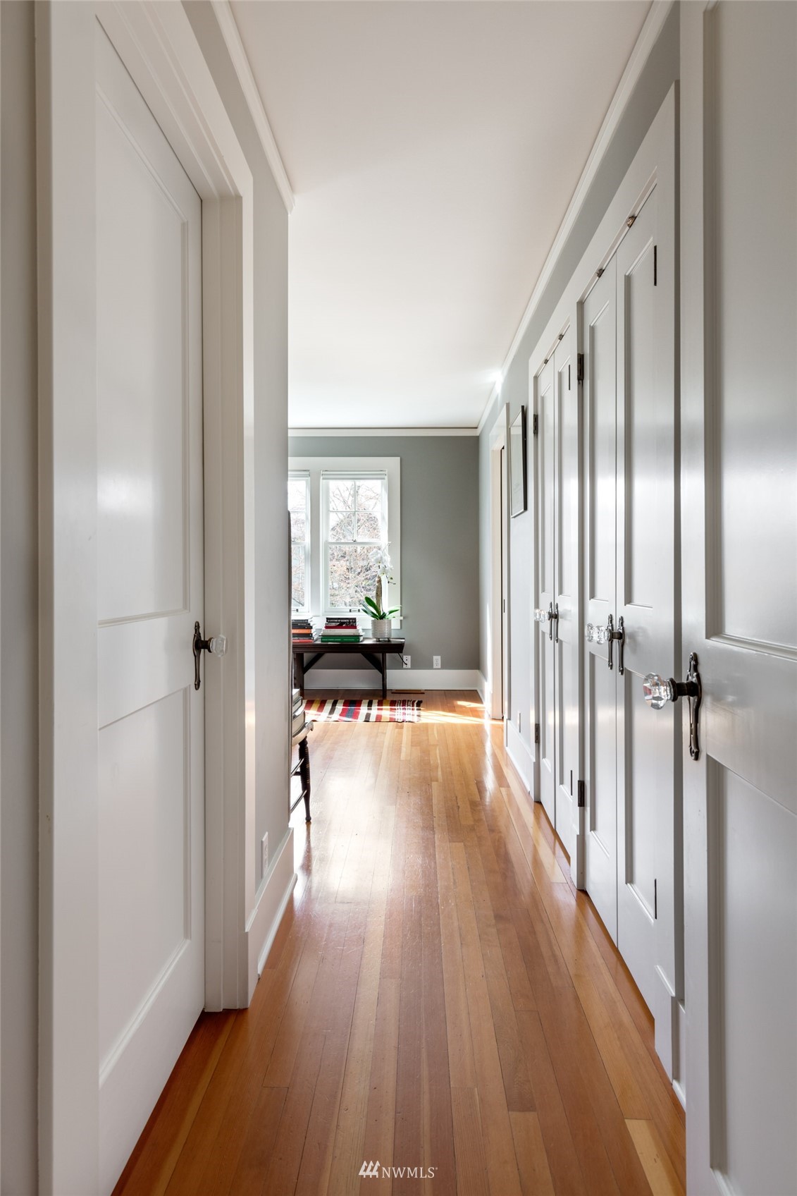 617 35th Avenue Seattle, WA 98122 - Photo 20 of 40 view of a hallway with wooden floor and furniture