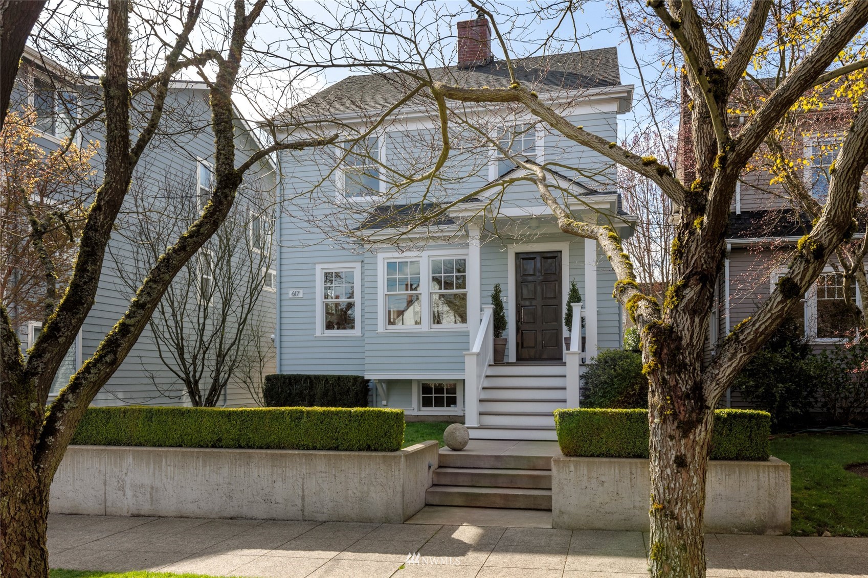 617 35th Avenue Seattle, WA 98122 - Photo 30 of 40 a front view of a house with garden