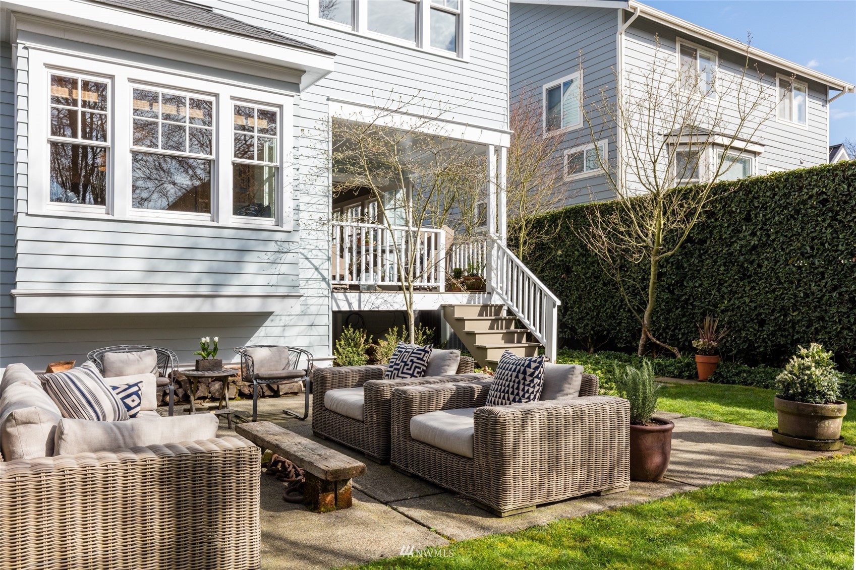 617 35th Avenue Seattle, WA 98122 - Photo 32 of 40 a view of a patio with couches table and chairs and potted plants