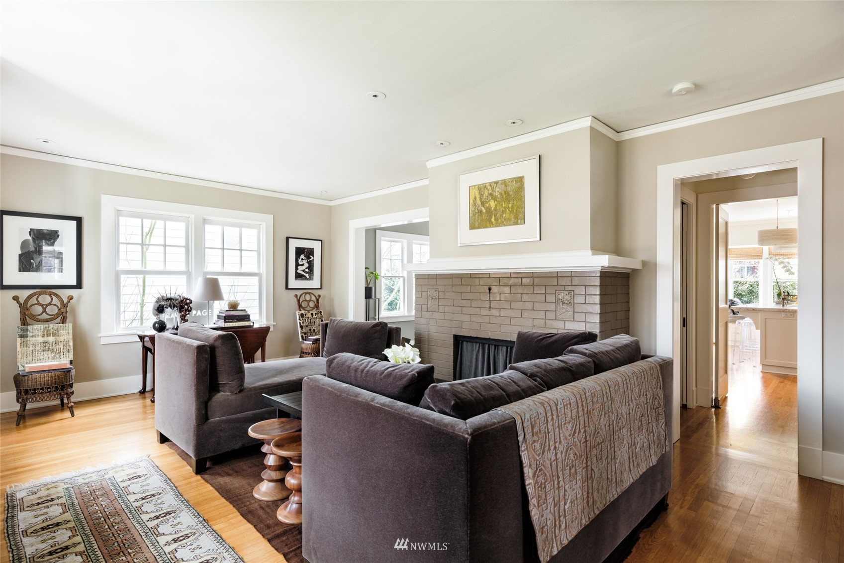 617 35th Avenue Seattle, WA 98122 - Photo 4 of 40 a living room with furniture and a fireplace